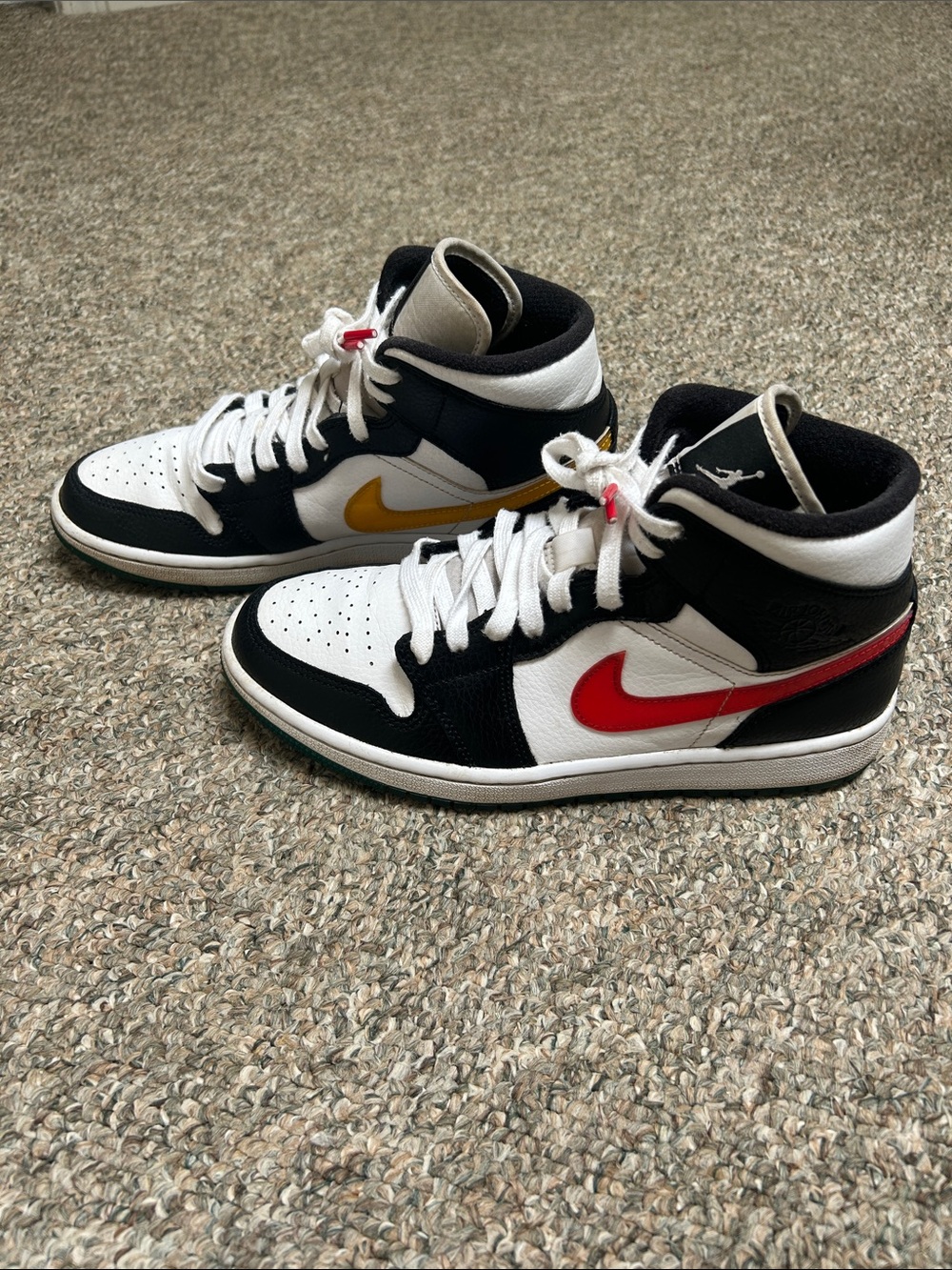 Nike Air Jordan 1 Mid Sneakers - alternate swooshes.
